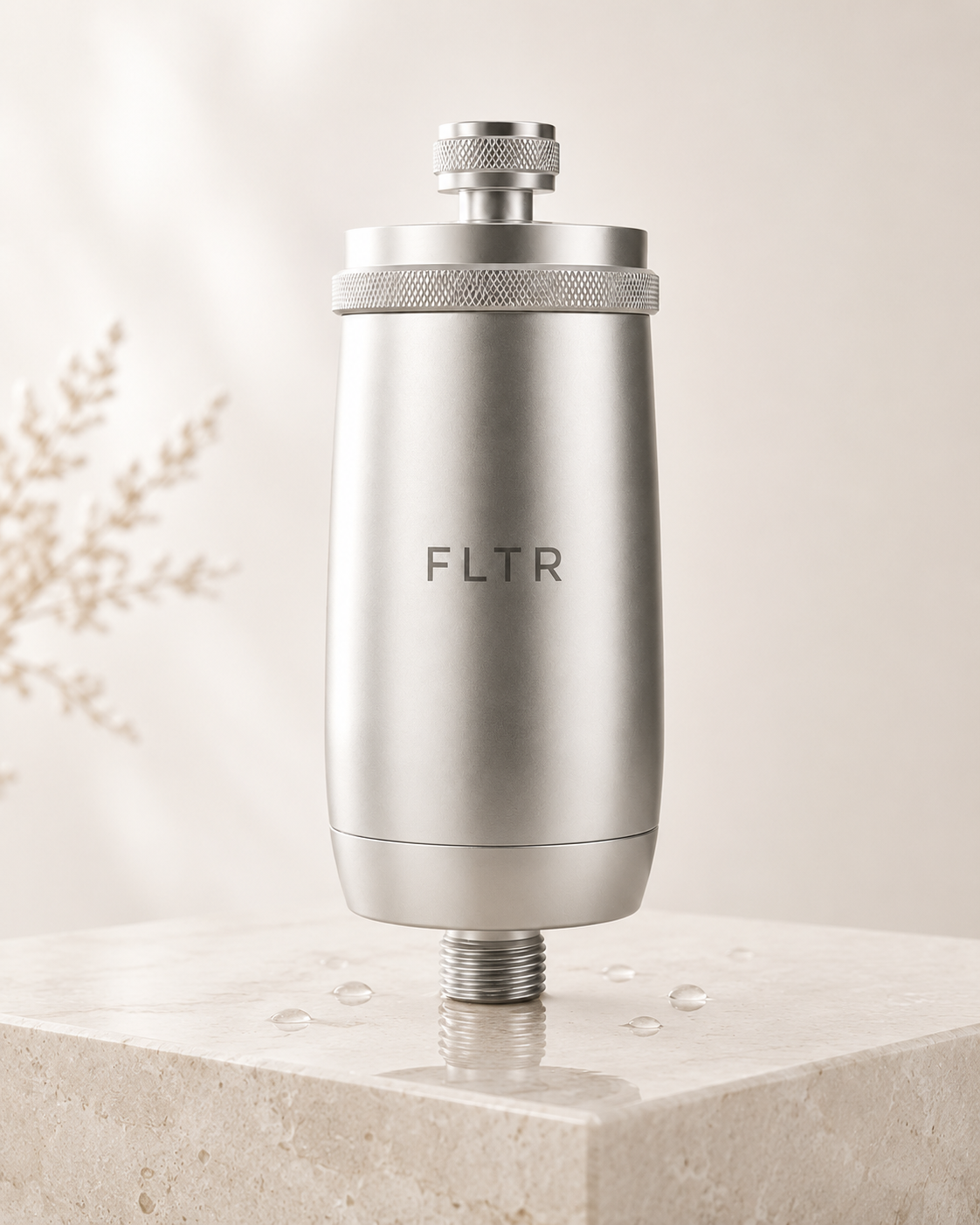 Filtre FYLTR sur pierre avec gouttes d'eau